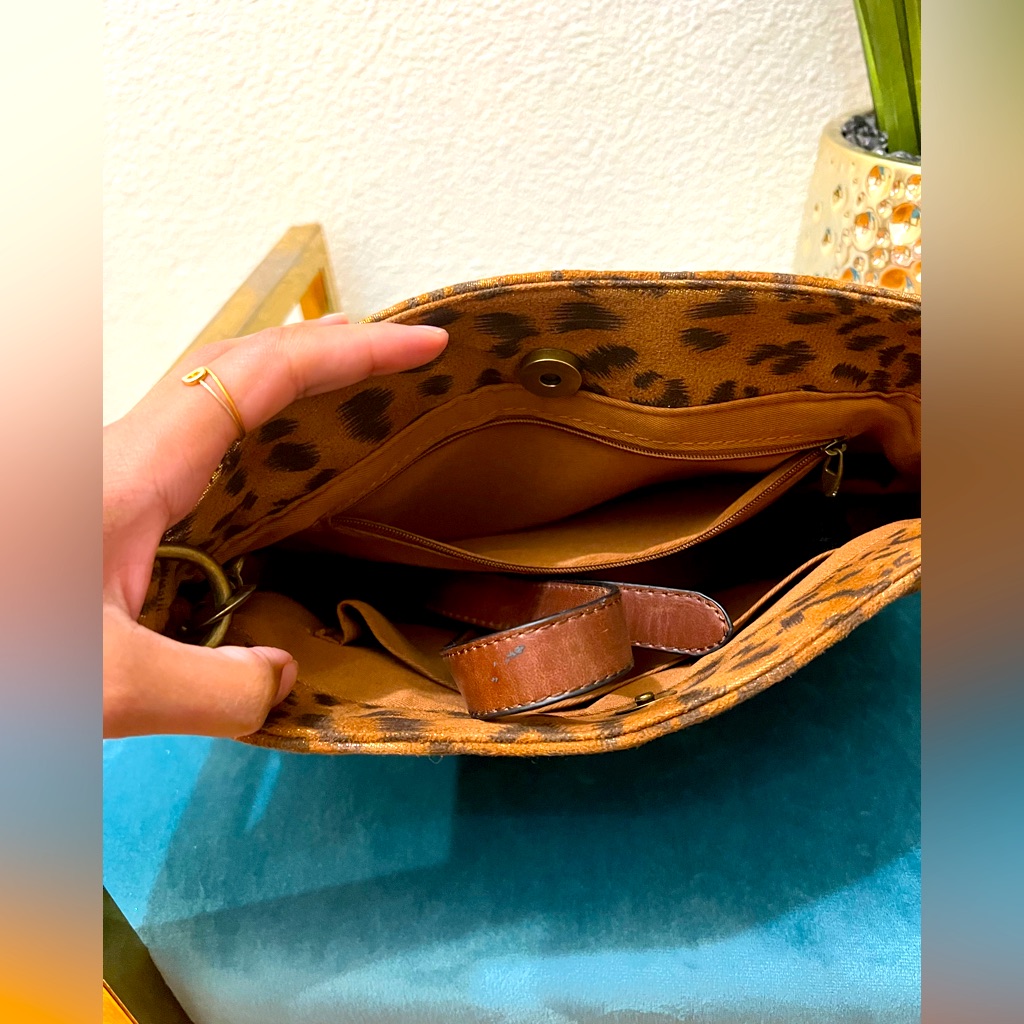Leopard Print Bag And It Comes With Adjustable Straps.